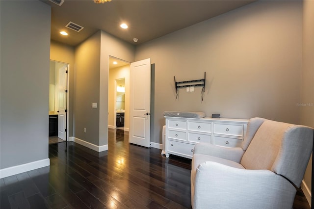 living area featuring dark hardwood / wood-style flooring