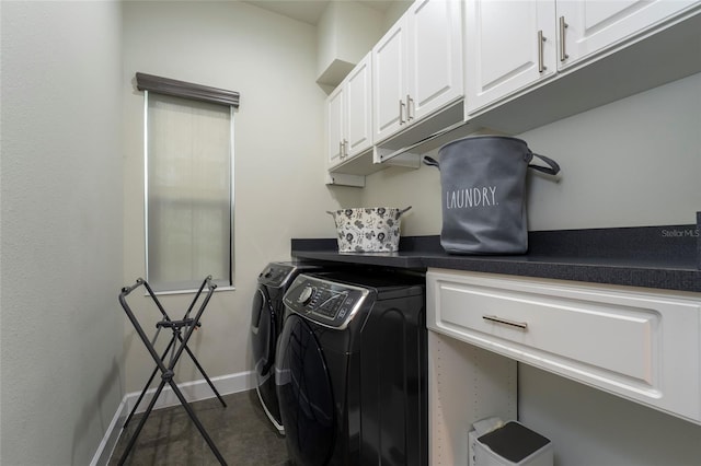 washroom with cabinets and separate washer and dryer