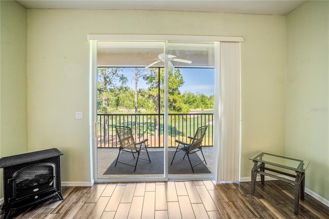 entryway with light hardwood / wood-style flooring and ceiling fan