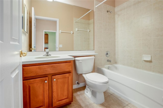 full bathroom featuring tiled shower / bath, toilet, tile flooring, and vanity