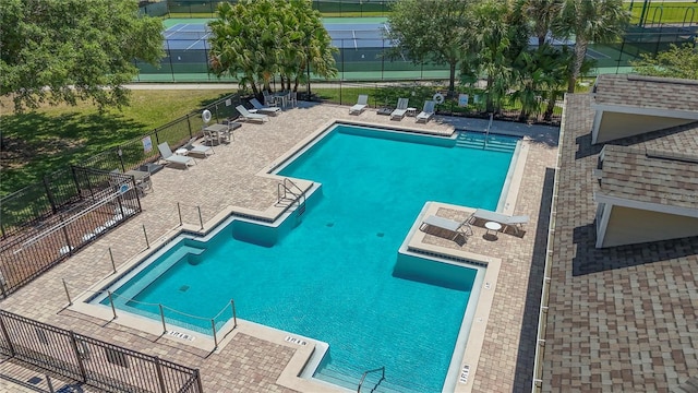 view of swimming pool featuring a patio area