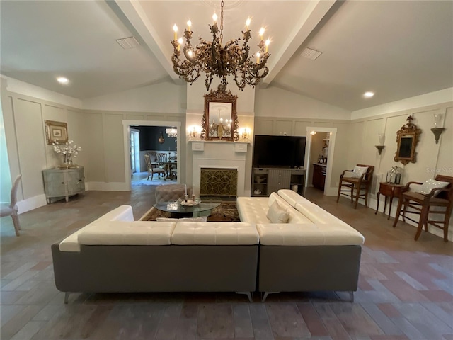 living room with lofted ceiling with beams, wood-type flooring, and a notable chandelier