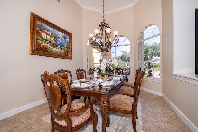 tiled dining area with ornamental molding and a chandelier