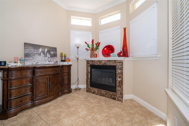 interior space with ornamental molding and light tile floors