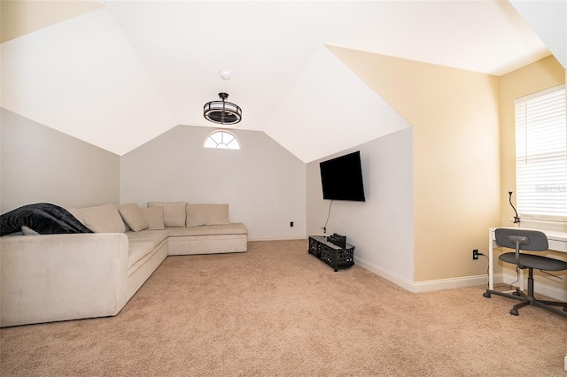 living room featuring lofted ceiling and light carpet