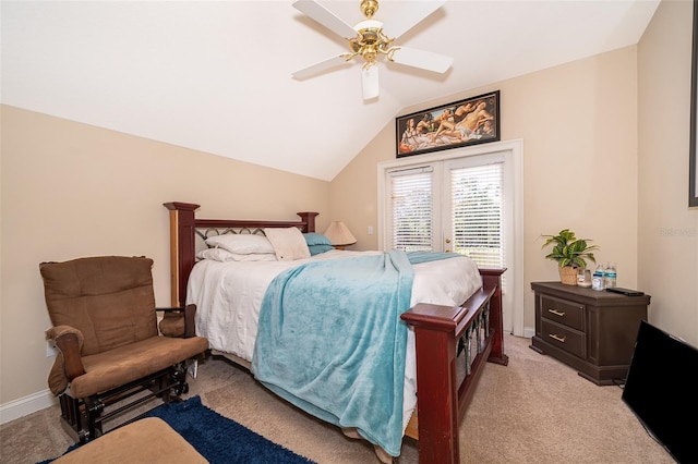 carpeted bedroom featuring lofted ceiling and ceiling fan