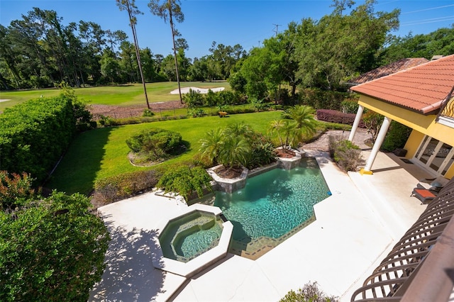 view of swimming pool with a patio, an in ground hot tub, and a lawn