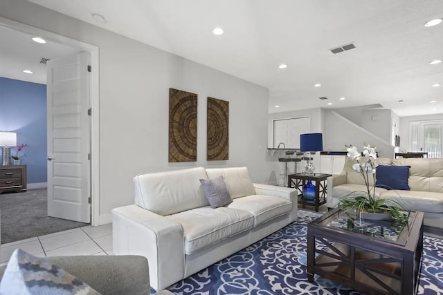 living room featuring light colored carpet