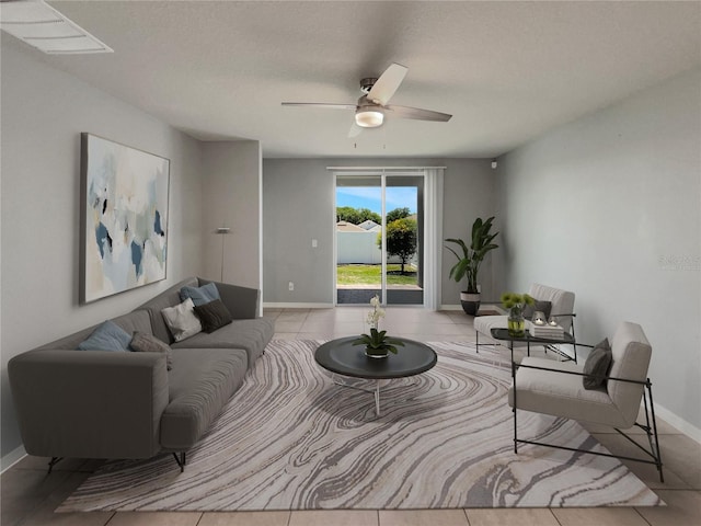 tiled living room featuring ceiling fan