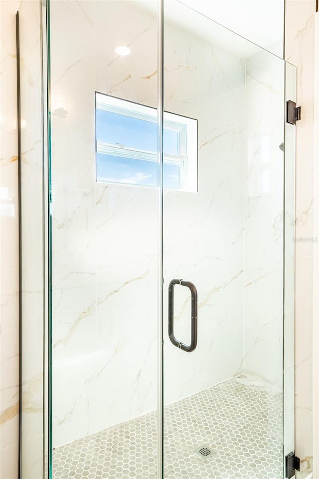 bathroom with an enclosed shower