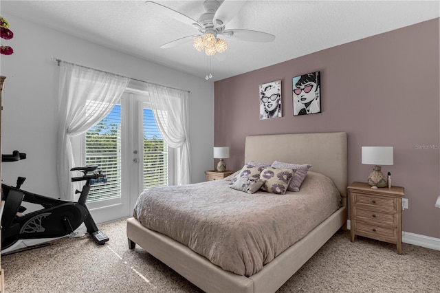 bedroom featuring a textured ceiling, ceiling fan, carpet, and access to outside