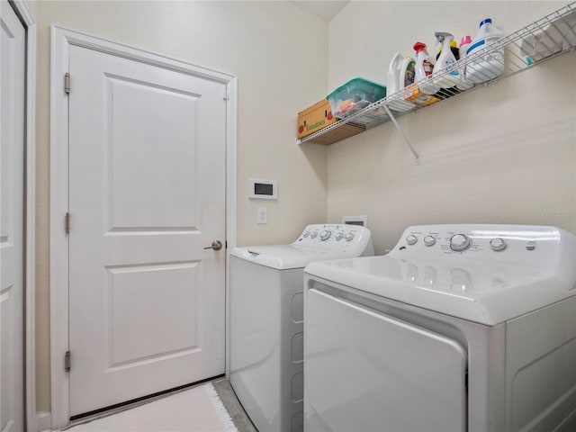 laundry area featuring washing machine and dryer