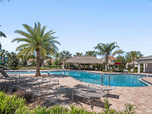 view of swimming pool featuring a patio area