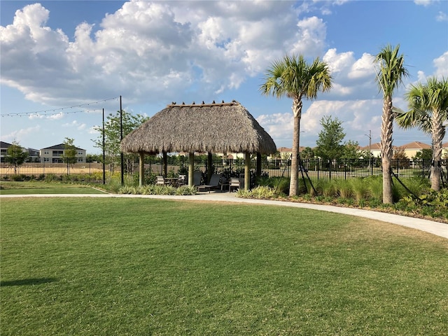 view of community with a lawn and a gazebo