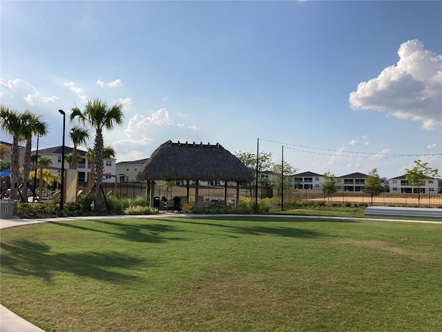 view of home's community featuring a lawn and a gazebo