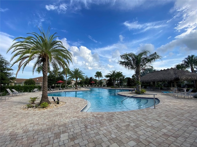 view of swimming pool featuring a patio area