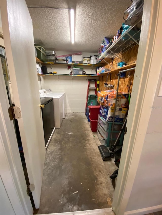 storage area with separate washer and dryer