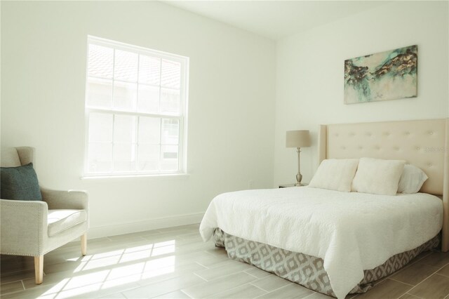 bedroom with light wood-type flooring