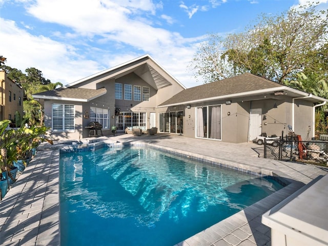 exterior space with a patio area and grilling area