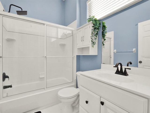 full bathroom featuring shower / tub combination, vanity, and toilet