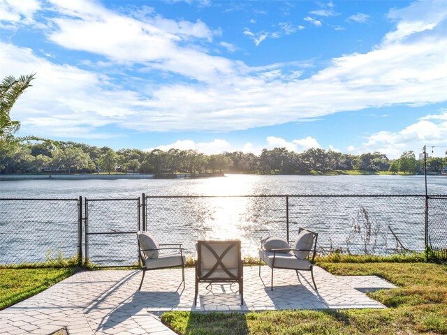 view of patio featuring a water view