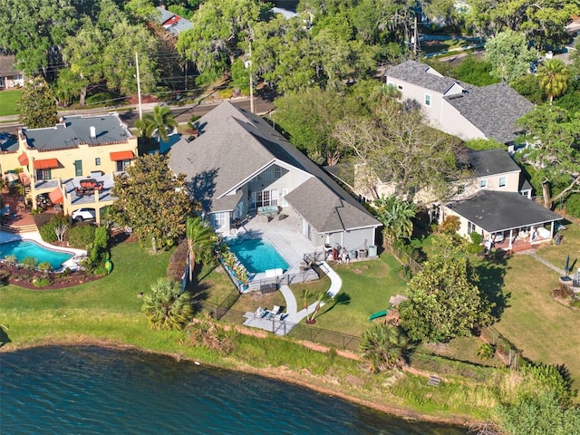 birds eye view of property featuring a water view