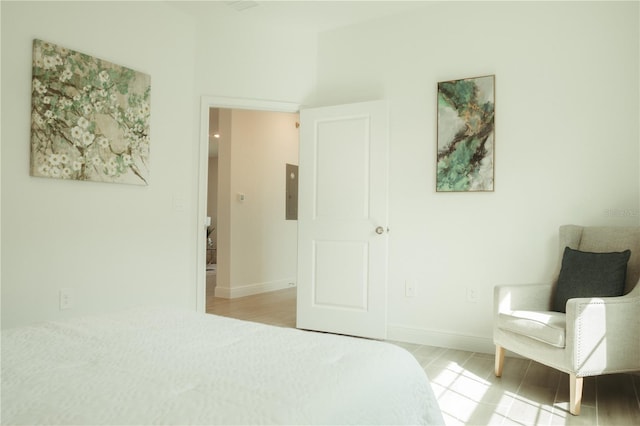 bedroom with light hardwood / wood-style floors