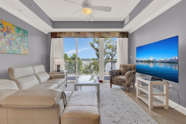 living room featuring ceiling fan and light tile patterned floors