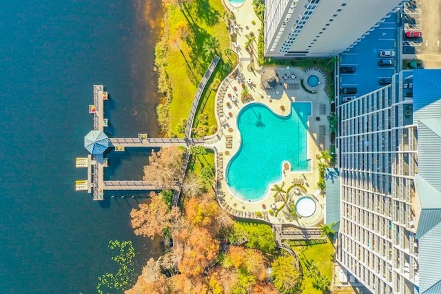 birds eye view of property featuring a water view