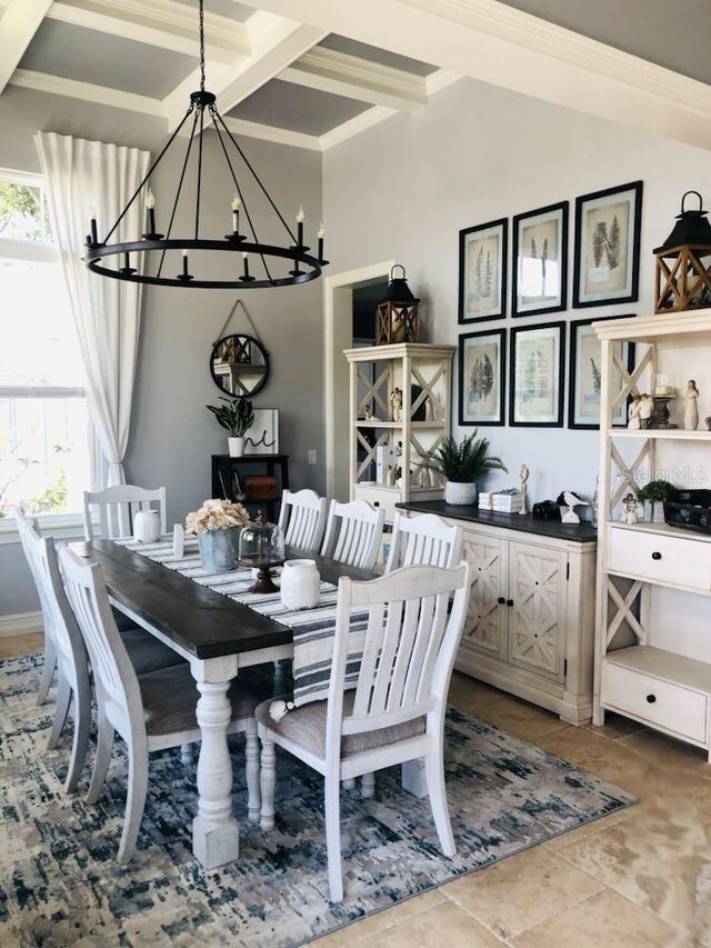 dining room with a chandelier, tile floors, and beamed ceiling