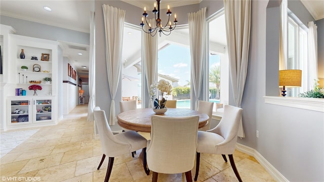 tiled dining space featuring built in features, crown molding, and a notable chandelier