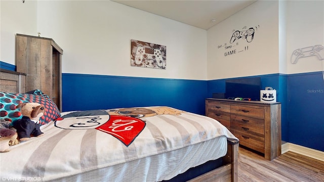 bedroom featuring light wood-type flooring