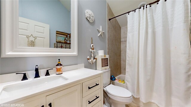 full bathroom featuring shower / tub combo with curtain, oversized vanity, and toilet