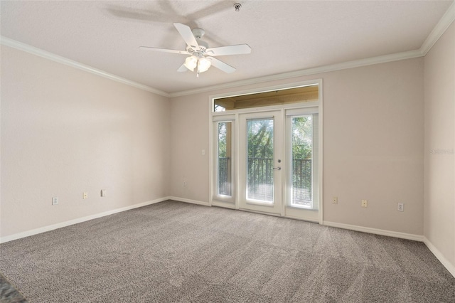 unfurnished room with carpet, crown molding, a textured ceiling, and ceiling fan