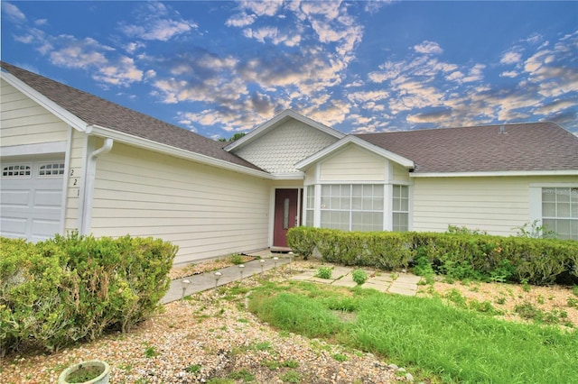 ranch-style home with a garage