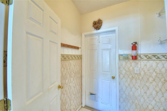 bathroom featuring a textured ceiling