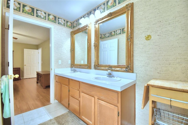 bathroom featuring tile patterned floors and vanity