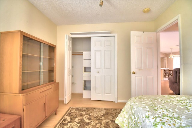 bedroom featuring a textured ceiling