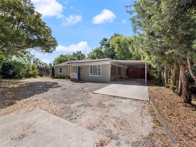 view of front of home featuring a carport