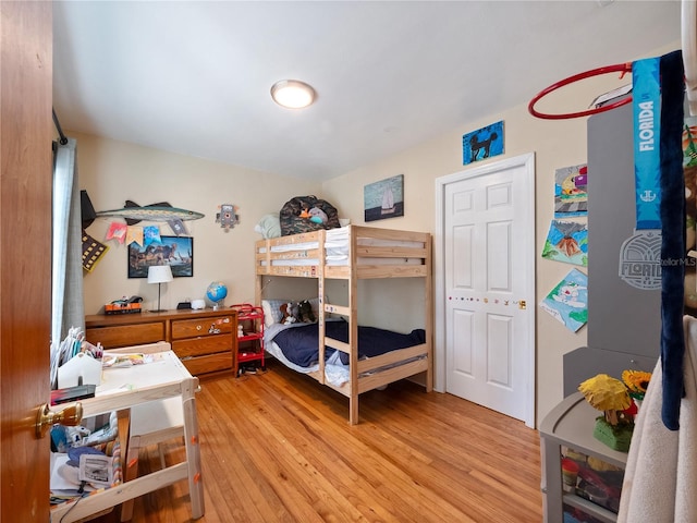 bedroom with light hardwood / wood-style flooring