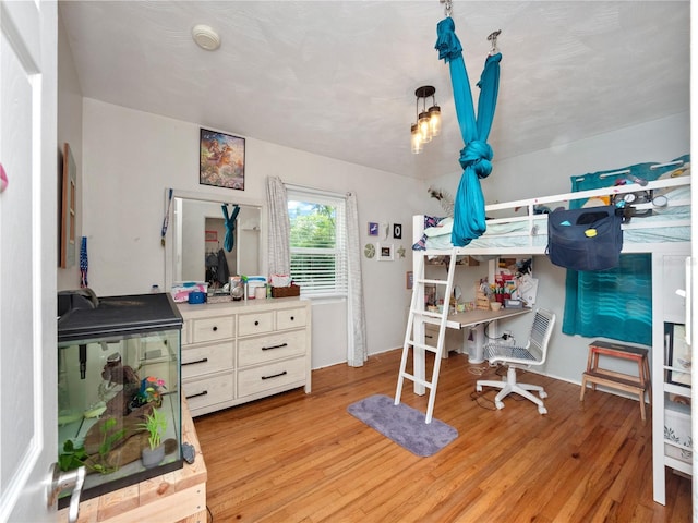 bedroom featuring light wood-type flooring