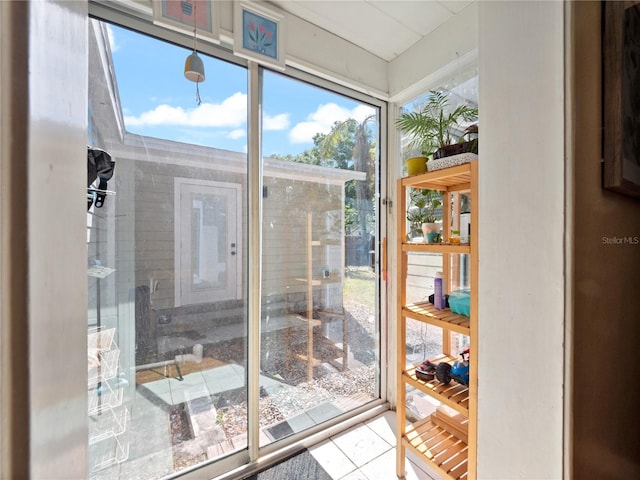 entryway with light tile flooring