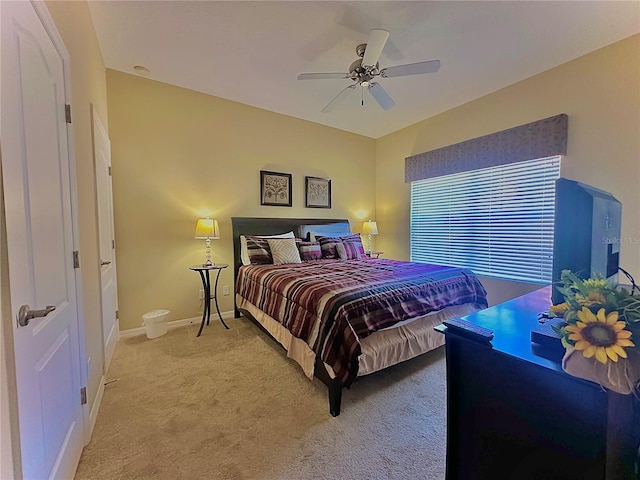 bedroom featuring ceiling fan and carpet flooring