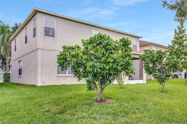 exterior space with a yard