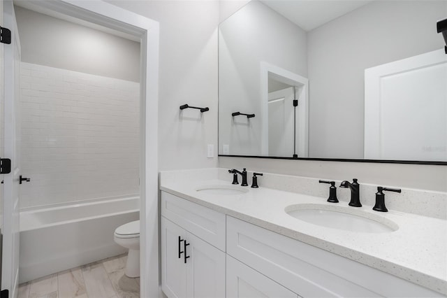 full bathroom with vanity, toilet, and shower / bathtub combination