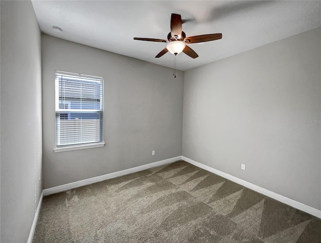 carpeted empty room with ceiling fan