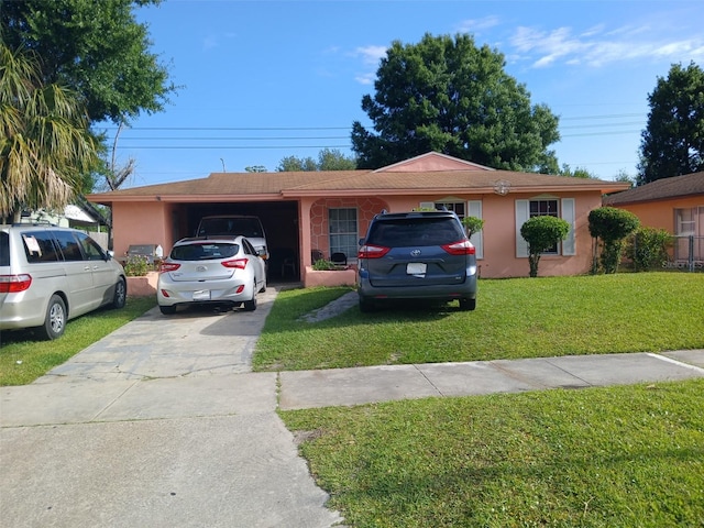 single story home with a garage and a front yard