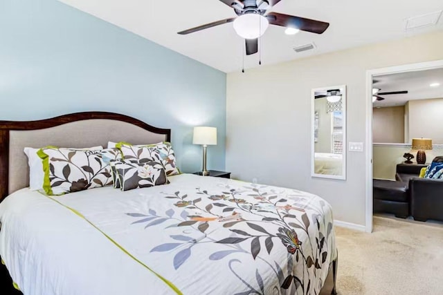 carpeted bedroom featuring ceiling fan