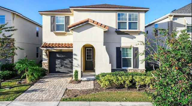 view of front of property with a garage