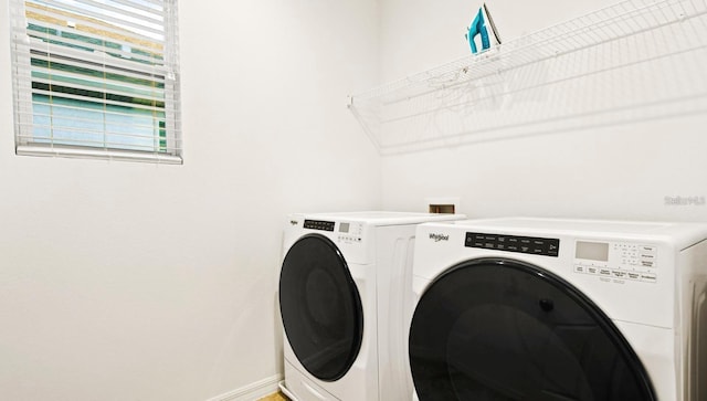 laundry area featuring washer hookup and separate washer and dryer